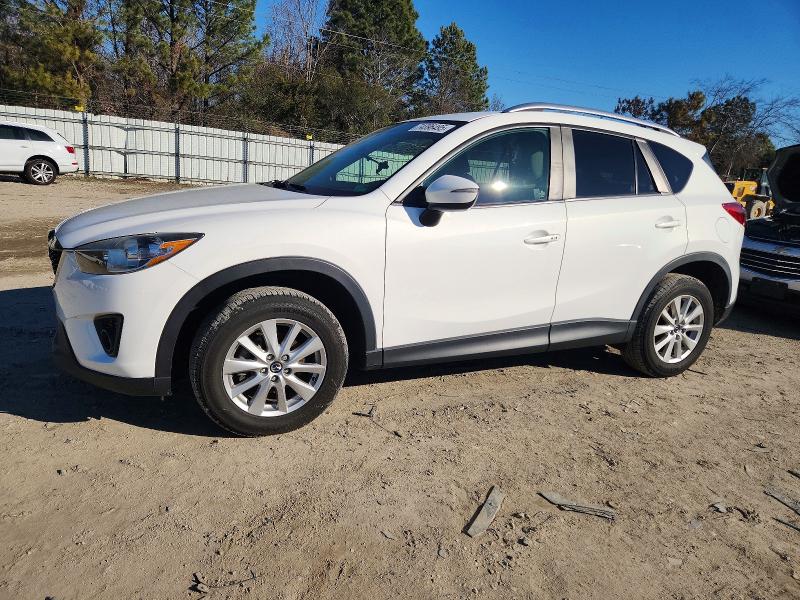 MAZDA CX-5 TOURI 2015 with VIN JM3KE2CYXF0539670 - Photo from auction
