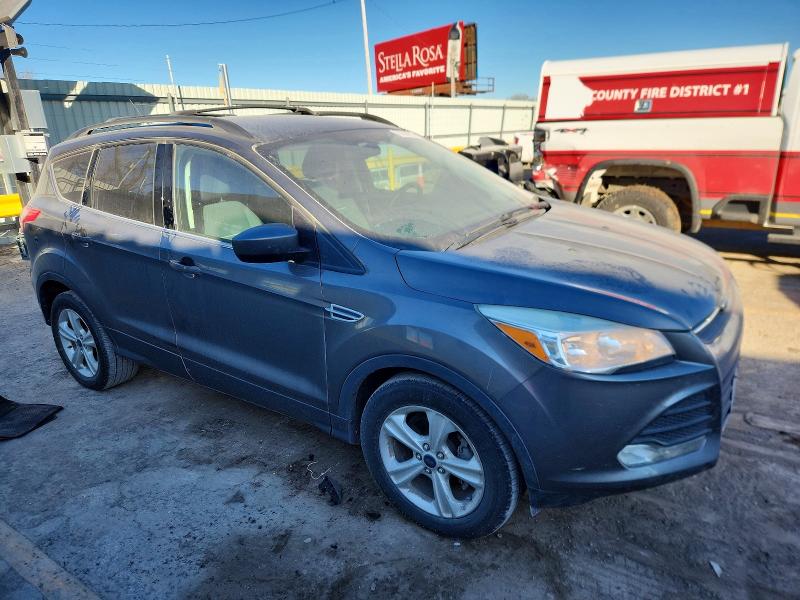 Photo 4 from auction – 2014 FORD ESCAPE with VIN 1FMCU0GX1EUD72768