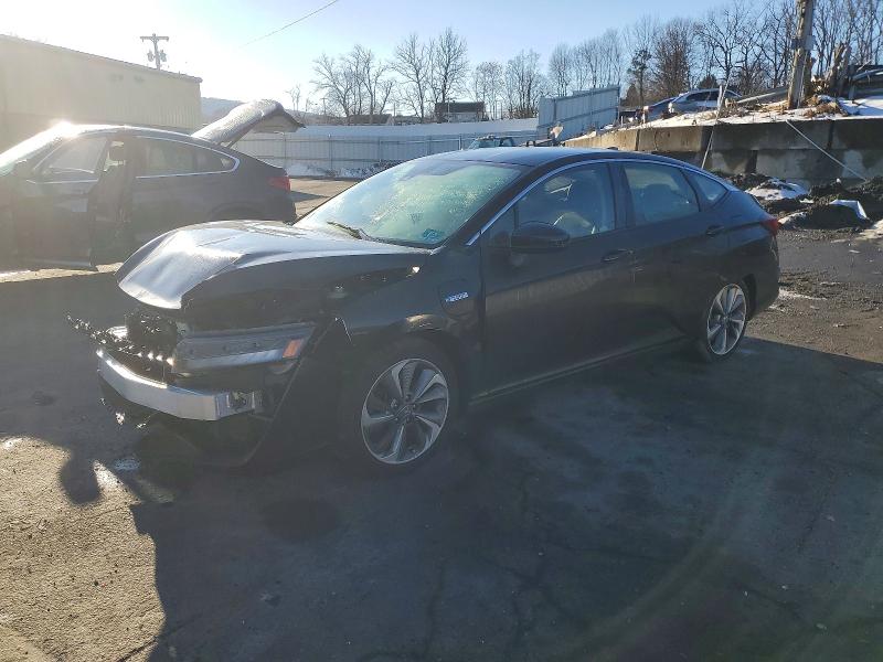 HONDA CLARITY 2018 with VIN JHMZC5F18JC014142 - Photo from auction