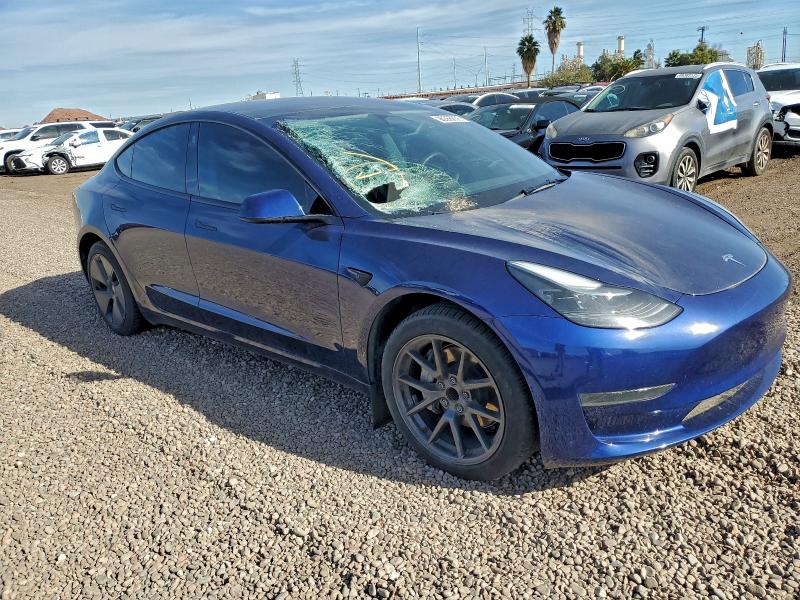 Photo 4 from auction – 2023 TESLA MODEL 3 with VIN 5YJ3E1EA4PF686674