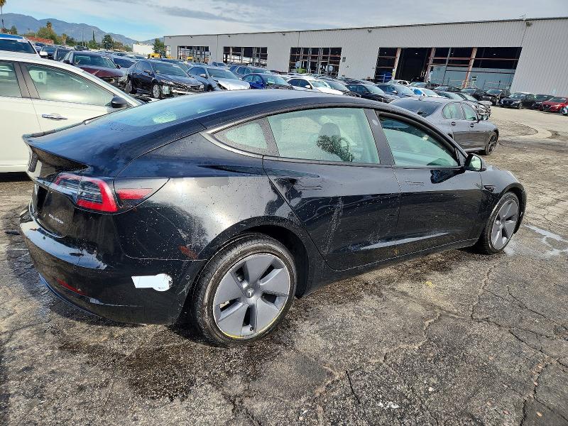 Photo 3 from auction – 2022 TESLA MODEL 3 with VIN 5YJ3E1EB6NF297928