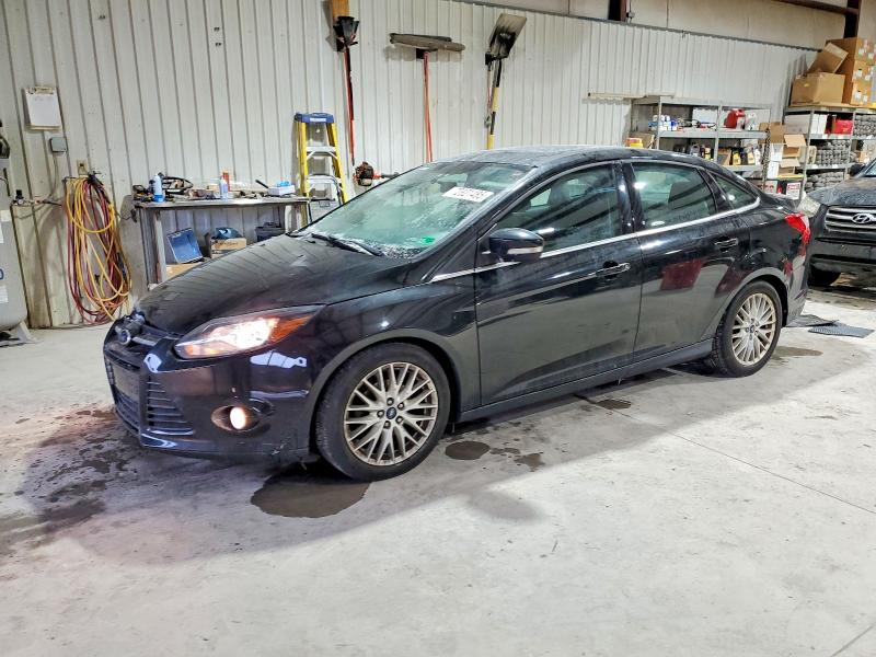 FORD FOCUS TITA 2014 with VIN 1FADP3J26EL115535 - Photo from auction