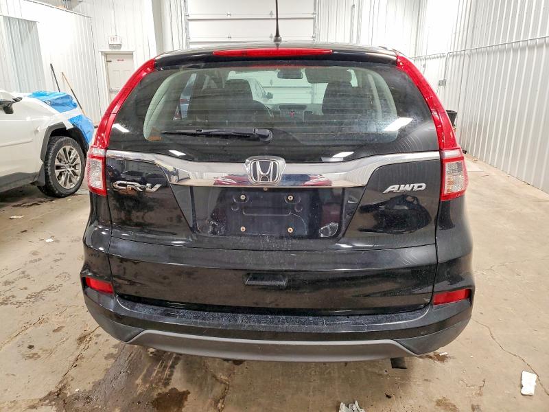 Photo 6 from auction – 2015 HONDA CR-V LX with VIN 2HKRM4H33FH691828