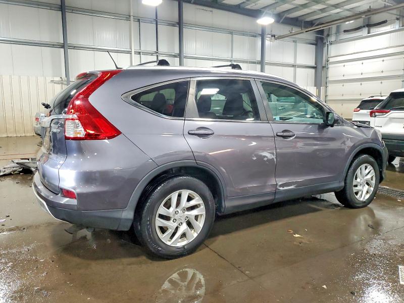 Photo 3 from auction – 2015 HONDA CR-V EXL with VIN 5J6RM4H77FL035608