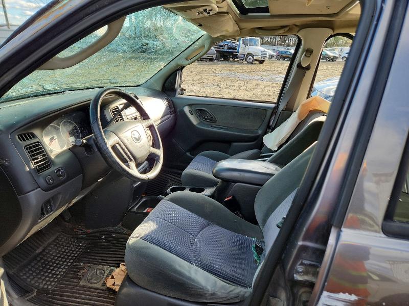 Photo 7 from auction – 2003 MAZDA TRIBUTE LX with VIN 4F2CZ04133KM36419