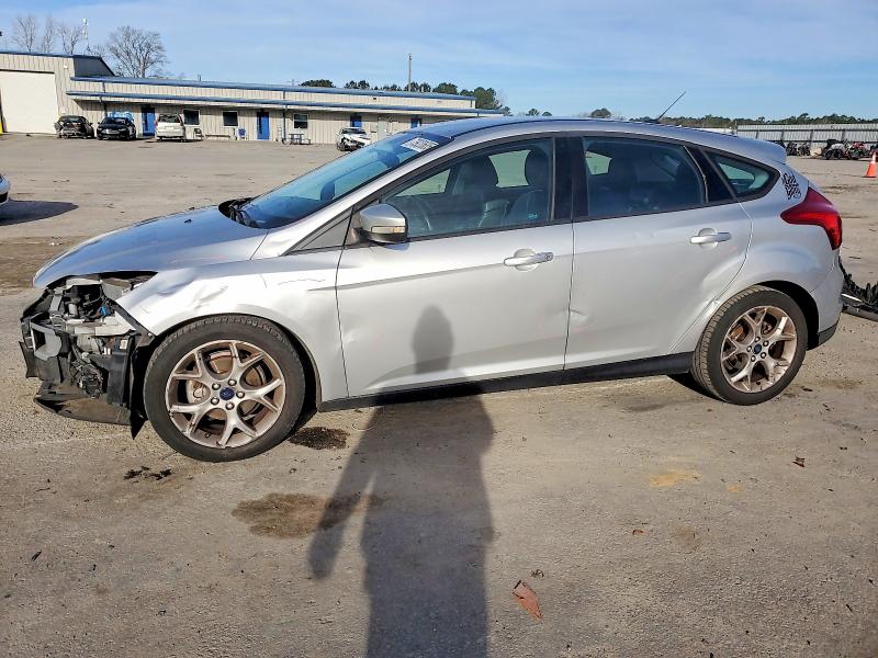 FORD FOCUS SE 2014 with VIN 1FADP3K20EL324140 - Photo from auction