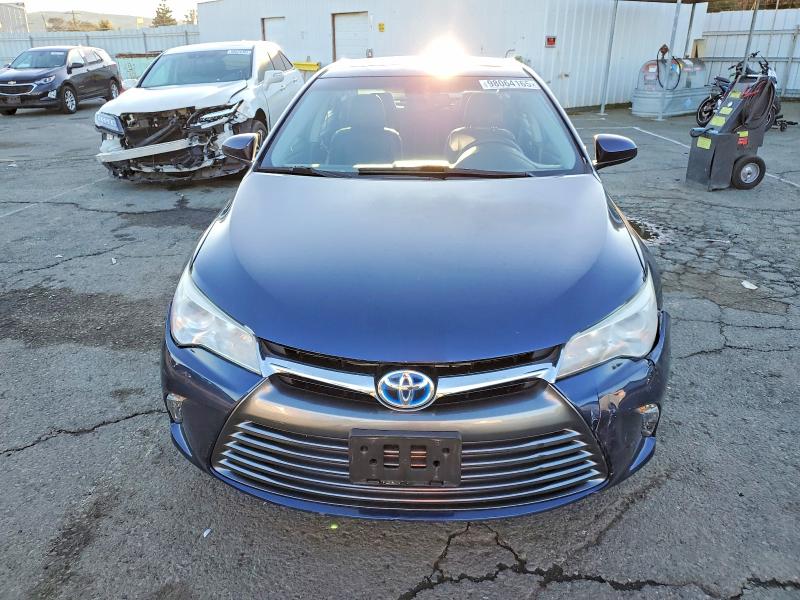 Photo 5 from auction – 2016 TOYOTA CAMRY HYBR with VIN 4T1BD1FK1GU198260