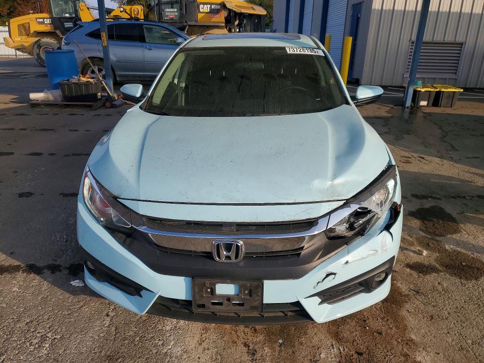 Photo 5 from auction – 2018 HONDA CIVIC EX with VIN JHMFC1F34JX005136