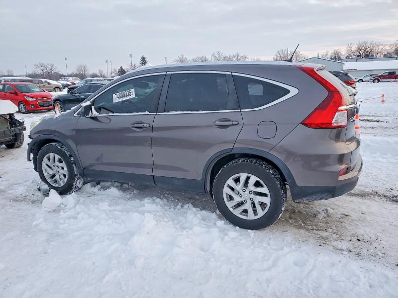 Photo 2 from auction – 2016 HONDA CR-V EXL with VIN 2HKRM4H77GH701393