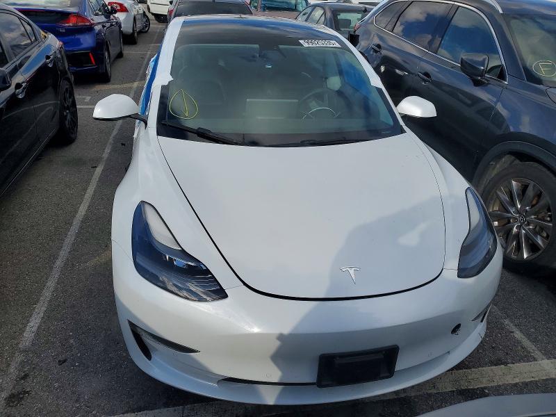 Photo 5 from auction – 2021 TESLA MODEL 3 with VIN 5YJ3E1EA0MF092126
