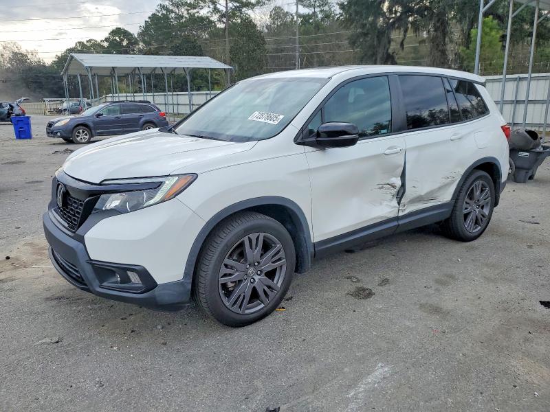 Photo 1 from auction – 2021 HONDA PASSPORT E with VIN 5FNYF7H57MB003009