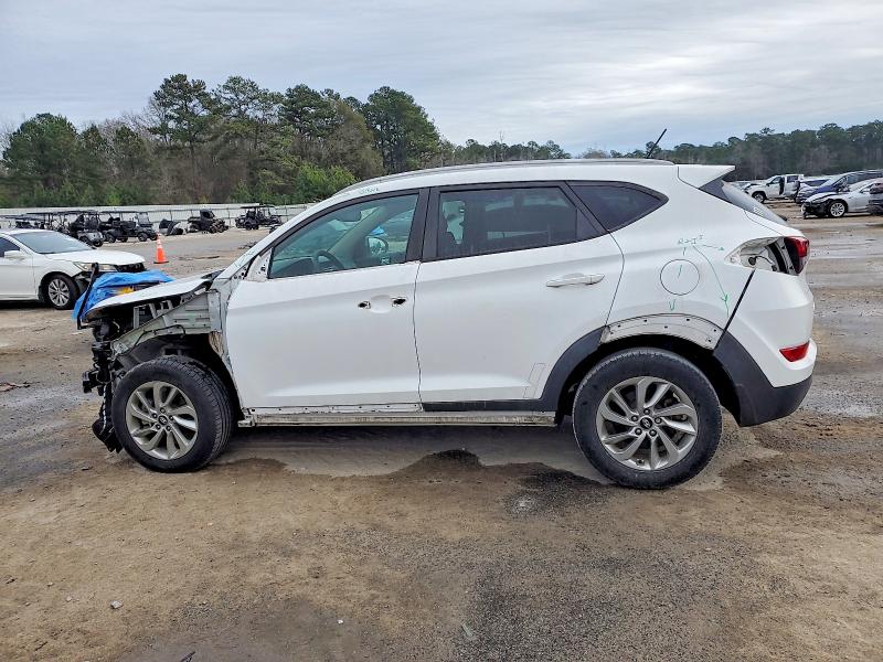 Photo 2 from auction – 2016 HYUNDAI TUCSON LIM with VIN KM8J33A21GU205077