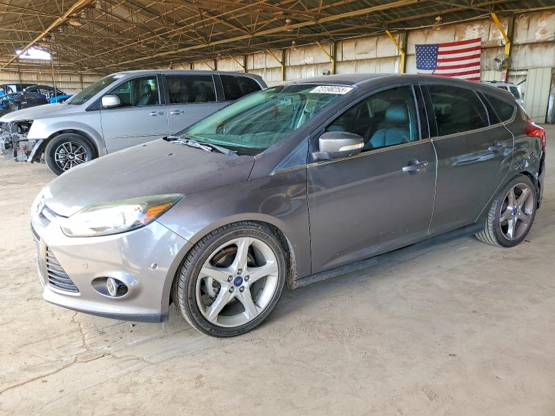 FORD FOCUS TITA 2014 with VIN 1FADP3N23EL287211 - Photo from auction