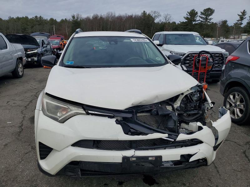 Photo 5 from auction – 2017 TOYOTA RAV4 LE with VIN JTMBFREV3HJ130571