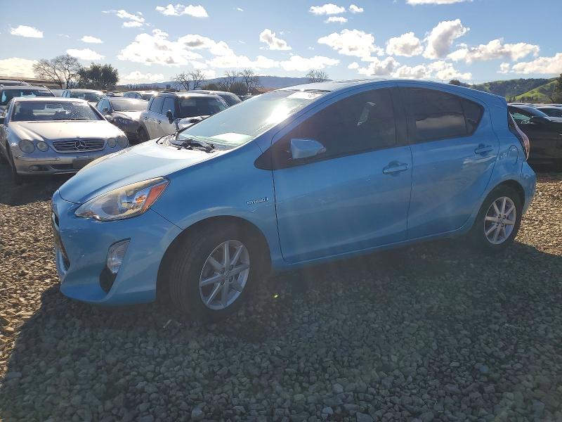 TOYOTA PRIUS C 2015 with VIN JTDKDTB33F1091905 - Photo from auction