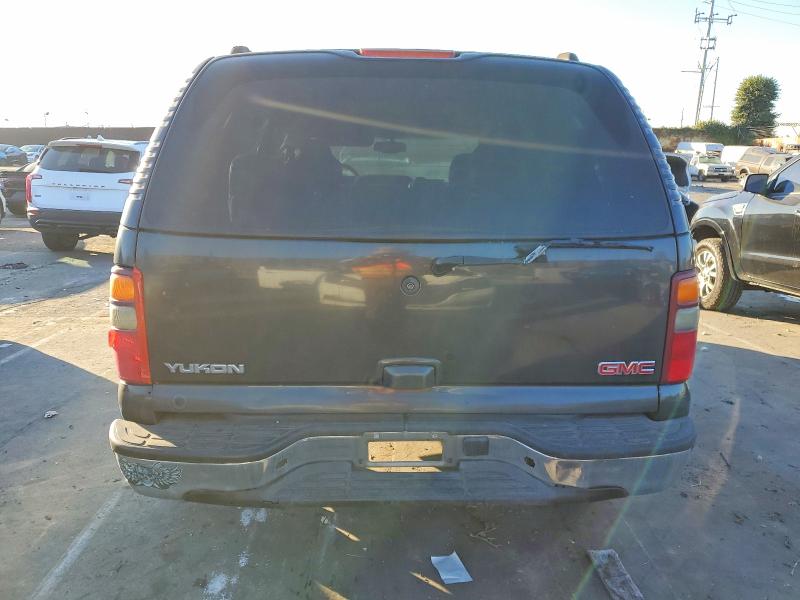 Photo 6 from auction – 2003 GMC YUKON with VIN 1GKEC13T63J331807