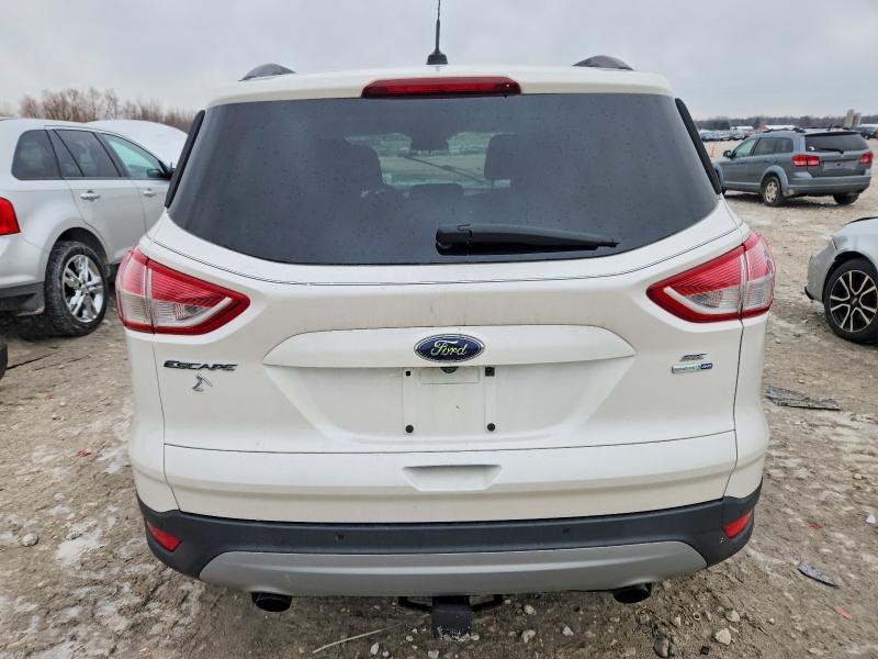 Photo 6 from auction – 2016 FORD ESCAPE SE with VIN 1FMCU9GX8GUA37739