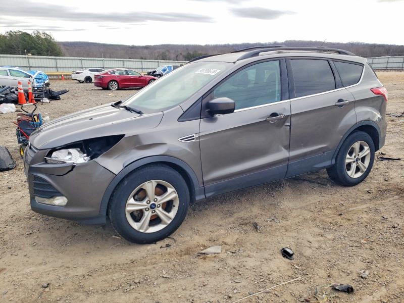 FORD ESCAPE 2014 with VIN 1FMCU0GX9EUC72837 - Photo from auction