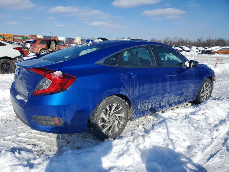 Photo 3 from auction – 2018 HONDA CIVIC EX with VIN 19XFC2F73JE044018