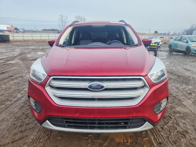 Photo 5 from auction – 2018 FORD ESCAPE SE with VIN 1FMCU9GD9JUD53163