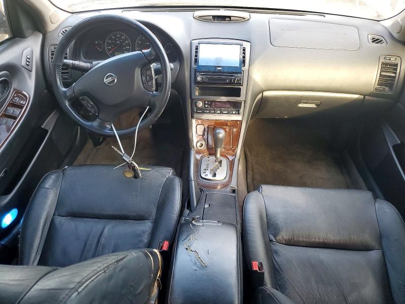 Photo 8 from auction – 2002 NISSAN MAXIMA with VIN JN1DA31A02T302156