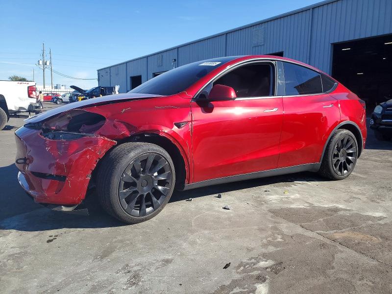 TESLA MODEL Y 2024 with VIN 7SAYGDED6RF043020 - Photo from auction