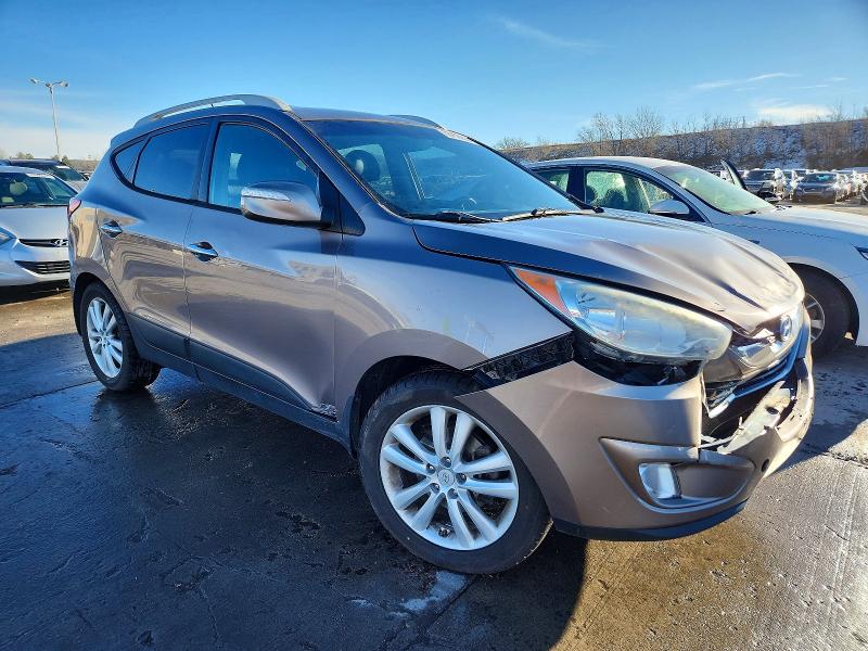 Photo 4 from auction – 2012 HYUNDAI TUCSON with VIN KM8JUCACXCU466109