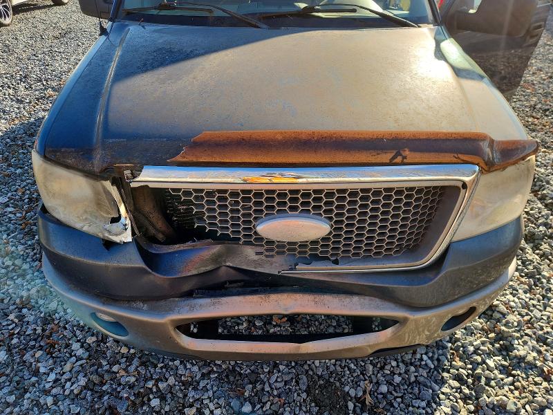 Photo 11 from auction – 2006 FORD F150 with VIN 1FTPX12516NA40852