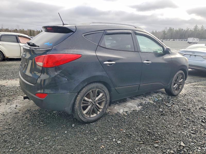 Photo 3 from auction – 2014 HYUNDAI TUCSON with VIN KM8JUCAG1EU861026