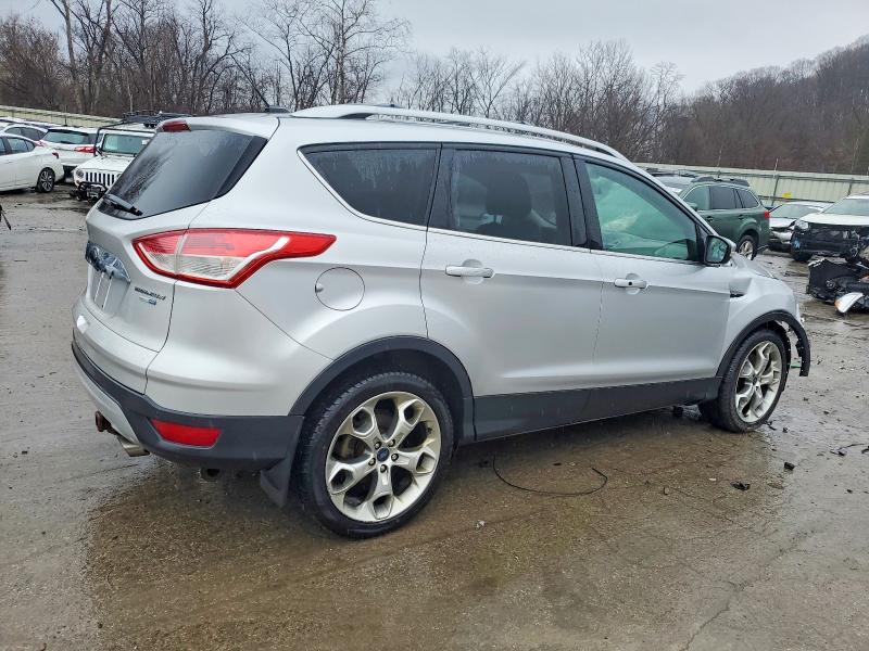 Photo 3 from auction – 2014 FORD ESCAPE TIT with VIN 1FMCU9J98EUD07396