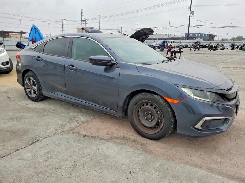 Photo 4 from auction – 2019 HONDA CIVIC LX with VIN 19XFC2F68KE215452