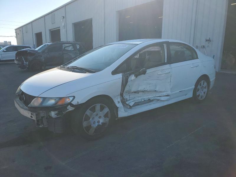 HONDA CIVIC LX 2011 with VIN 19XFA1F53BE031933 - Photo from auction