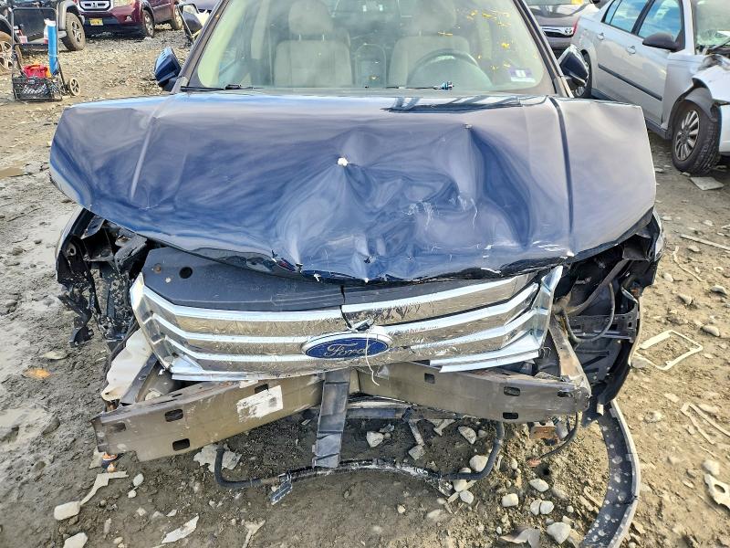 Photo 11 from auction – 2008 FORD TAURUS X with VIN 1FMDK02W88GA27717