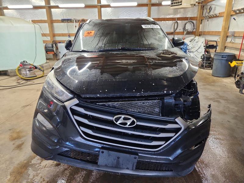 Photo 5 from auction – 2016 HYUNDAI TUCSON LIM with VIN KM8J3CA49GU221092