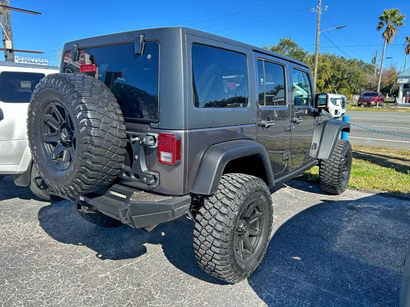 Photo 4 from auction – 2016 JEEP WRANGLER U with VIN 1C4BJWFG9GL235583