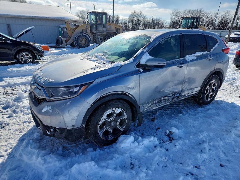 HONDA CR-V EX 2018 with VIN 7FARW2H58JE030100 - Photo from auction