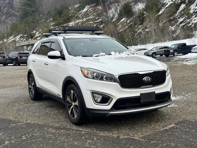 KIA SORENTO EX 2016 with VIN 5XYPHDA51GG100718 - Photo from auction