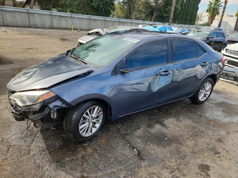 TOYOTA COROLLA L 2014 with VIN 5YFBURHE5EP089286 - Photo from auction