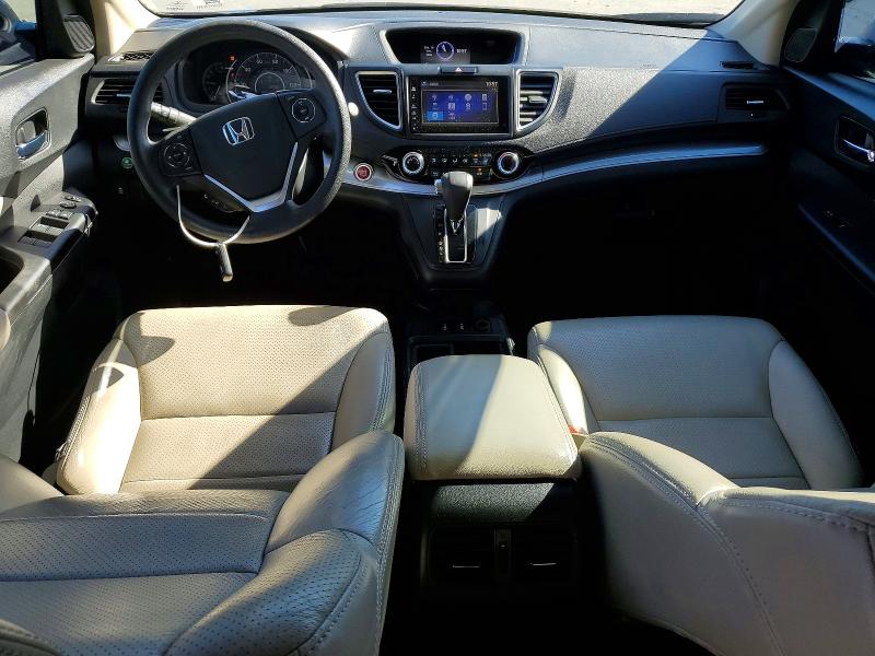 Photo 8 from auction – 2015 HONDA CR-V with VIN 2HKRM3H50FH526928