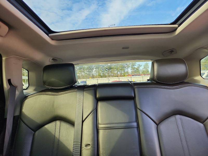 Photo 10 from auction – 2013 CADILLAC SRX PERFOR with VIN 3GYFNDE34DS594624