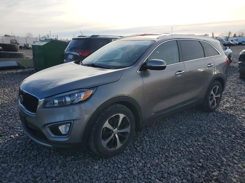 KIA SORENTO EX 2016 with VIN 5XYPHDA55GG155222 - Photo from auction