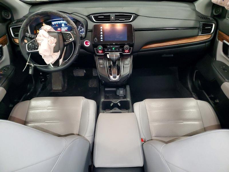 Photo 8 from auction – 2017 HONDA CR-V with VIN 5J6RW2H94HL011978