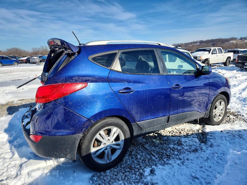 Photo 3 from auction – 2011 HYUNDAI TUCSON GLS with VIN KM8JUCAC3BU257356