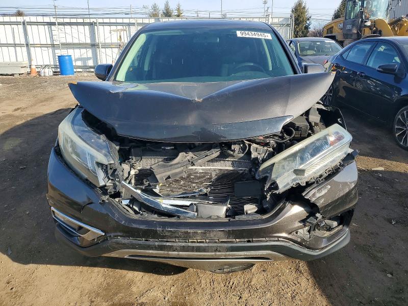 Photo 5 from auction – 2016 HONDA CR-V EX with VIN 2HKRM4H55GH627230