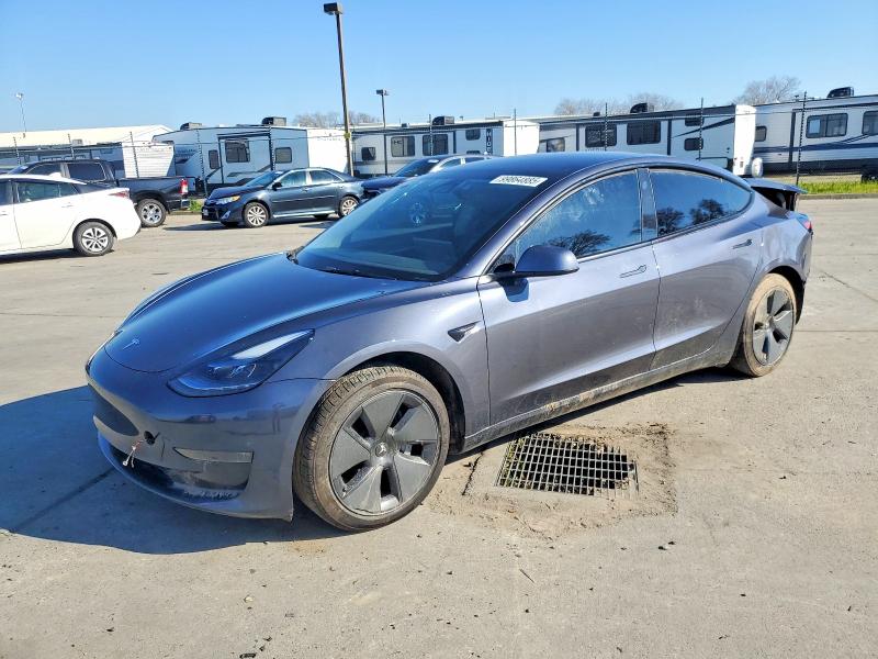 TESLA MODEL 3 2023 with VIN 5YJ3E1EA8PF559734 - Photo from auction
