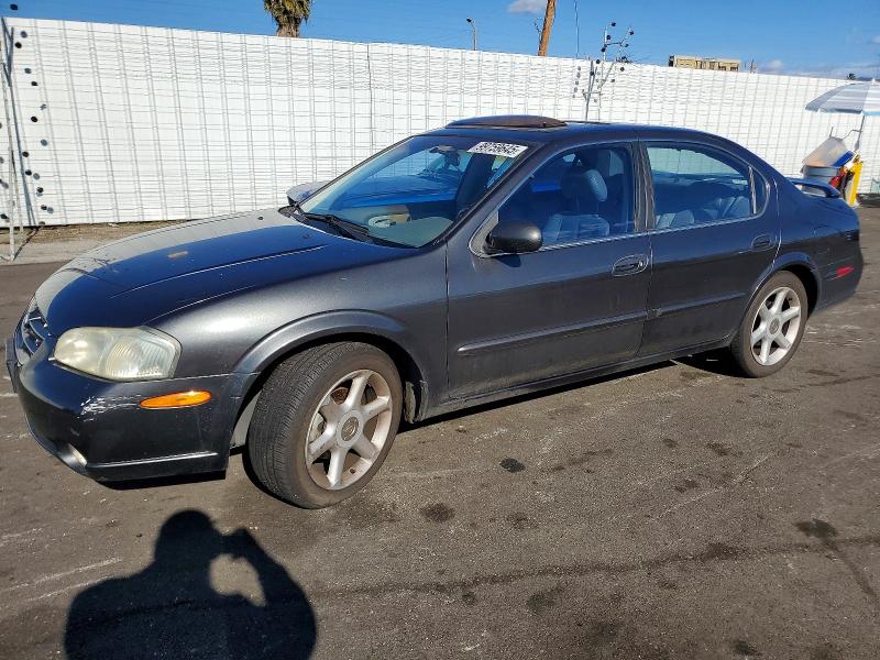 NISSAN MAXIMA GLE 2000 with VIN JN1CA31A3YT033879 - Photo from auction
