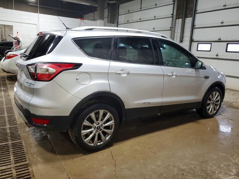 Photo 3 from auction – 2017 FORD ESCAPE TIT with VIN 1FMCU9JD3HUB97771