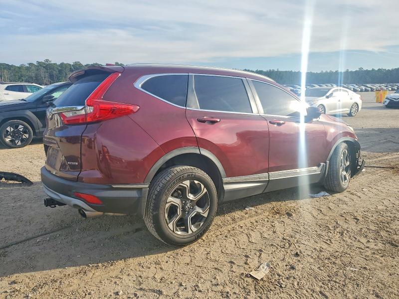 Photo 3 from auction – 2017 HONDA CR-V with VIN 7FARW1H98HE032923