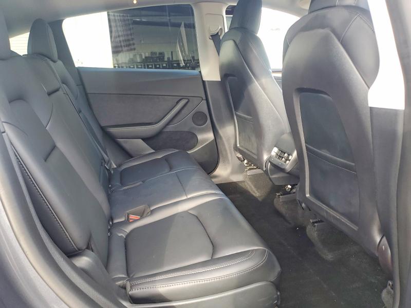 Photo 11 from auction – 2023 TESLA MODEL Y with VIN 7SAYGAEE4PF612385
