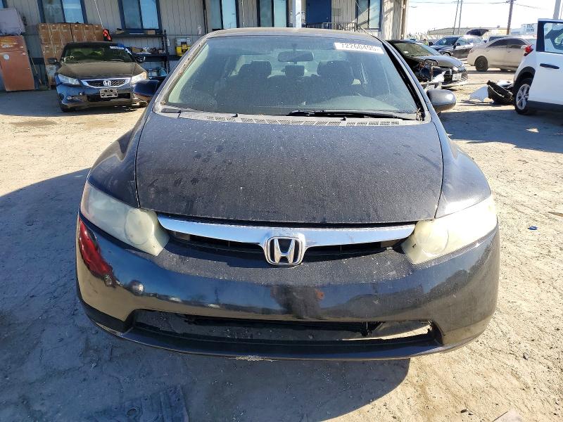 Photo 5 from auction – 2006 HONDA CIVIC LX with VIN 1HGFA16516L130913